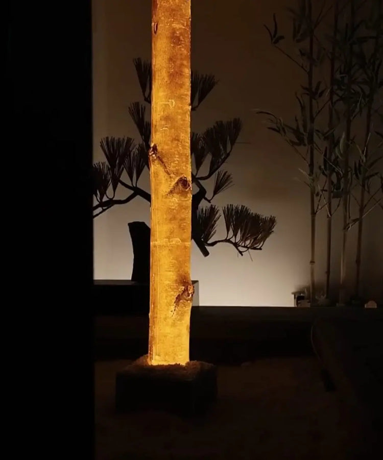 Birch logs with decorative LED lights, perfect for indoor and outdoor use, adding warmth and natural style to any space.