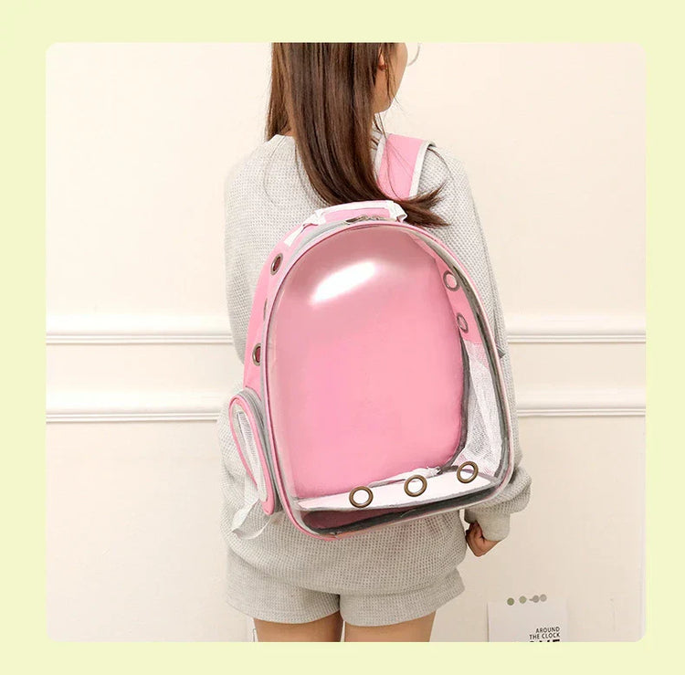 Pink cat backpack for a comfortable trip to the park or vet.