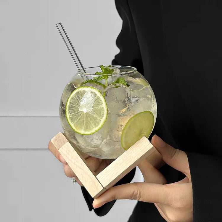 Contemporary glass tumbler, perfect for cocktails, mocktails, or iced tea.