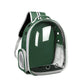 Cat enjoying scenery inside clear capsule pet carrier