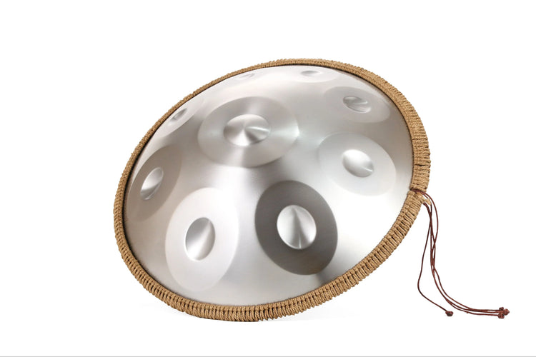 Playing Handpan Drum Set during sound therapyClose-up of Handpan Drum Set note layout