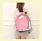 Pink cat backpack for a comfortable trip to the park or vet.